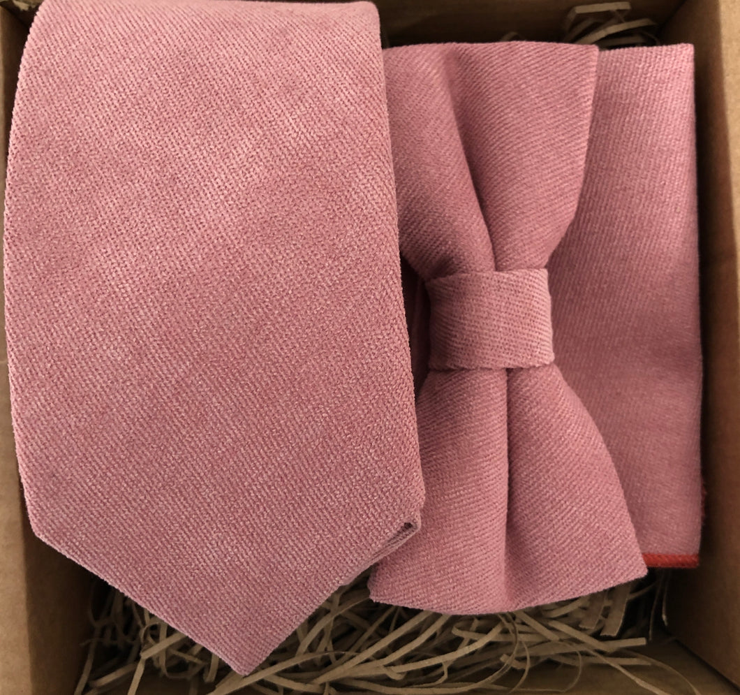 A blush pink men's tie, bow tie and pocket square in high quality cotton ideal as a wedding tie. This is a formal tie and bow tie set which comes with free gift wrapping and makes an ideal men's gift and Christmas gift. made by hand at Daisy and Oak Studio.