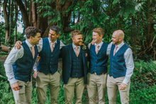 Load image into Gallery viewer, A group of groomsmen wearing pink floral chunky wool ie. The tie is handmade by Daisy and Oak Studio and comes in a chunky wool fabric which is ideal for a a Half Windsor knot.