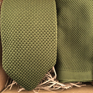 An olive green knitted tie and pocket square set ideal formal wear and matches perfectly with a blue suit. The tie set makes the perfect men's gift and has free gift wrapping. Handmade at Daisy and Oak Studio, UK