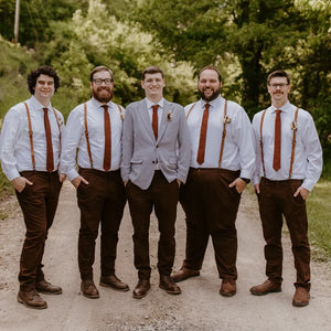 Groomsmen wearing a burnt orange tie with brown cords to match the wedding dress. The rust tie is beautifully wrapped and ideal for wedding gifts, men's gifts and Christmas gifts.