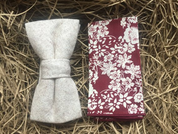 A cream wool bow tie and red floral pocket square. The set comes with free gift wrapping perfect for men's gifts and wedding ties. This highly original bow tie is made by Daisy and Oak Studio.