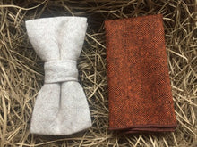 Load image into Gallery viewer, A cream wool bow tie and a burnt orange wool pocket square. The set comes gift wrapped and is idea formal wear with a navy suit. The set is handmade in at the Daisy and Oak Studio, UK.