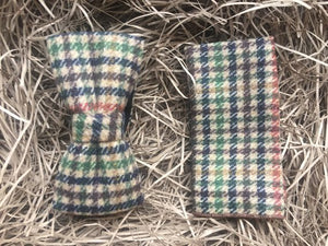 A houndstooth check bow tie and pocket square in a green, navy, brown and burnt orange wool. The set comes gift wrapped and makes a fabulous men's gift for Christmas, as a groomsman gift or a grooms wedding tie paired with a tweed suit.