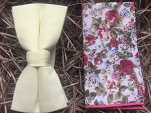 Load image into Gallery viewer, A bespoke bow tie by Daisy and oak Studio  in lemon yellow by Daisy and oak studio. The bow tie is made in cotton and matched with a floral pink pocket square or men&#39;s handkerchief. The set make a fabulous gift wrapped men&#39;s gift, secret Santa or groomsmen gift.